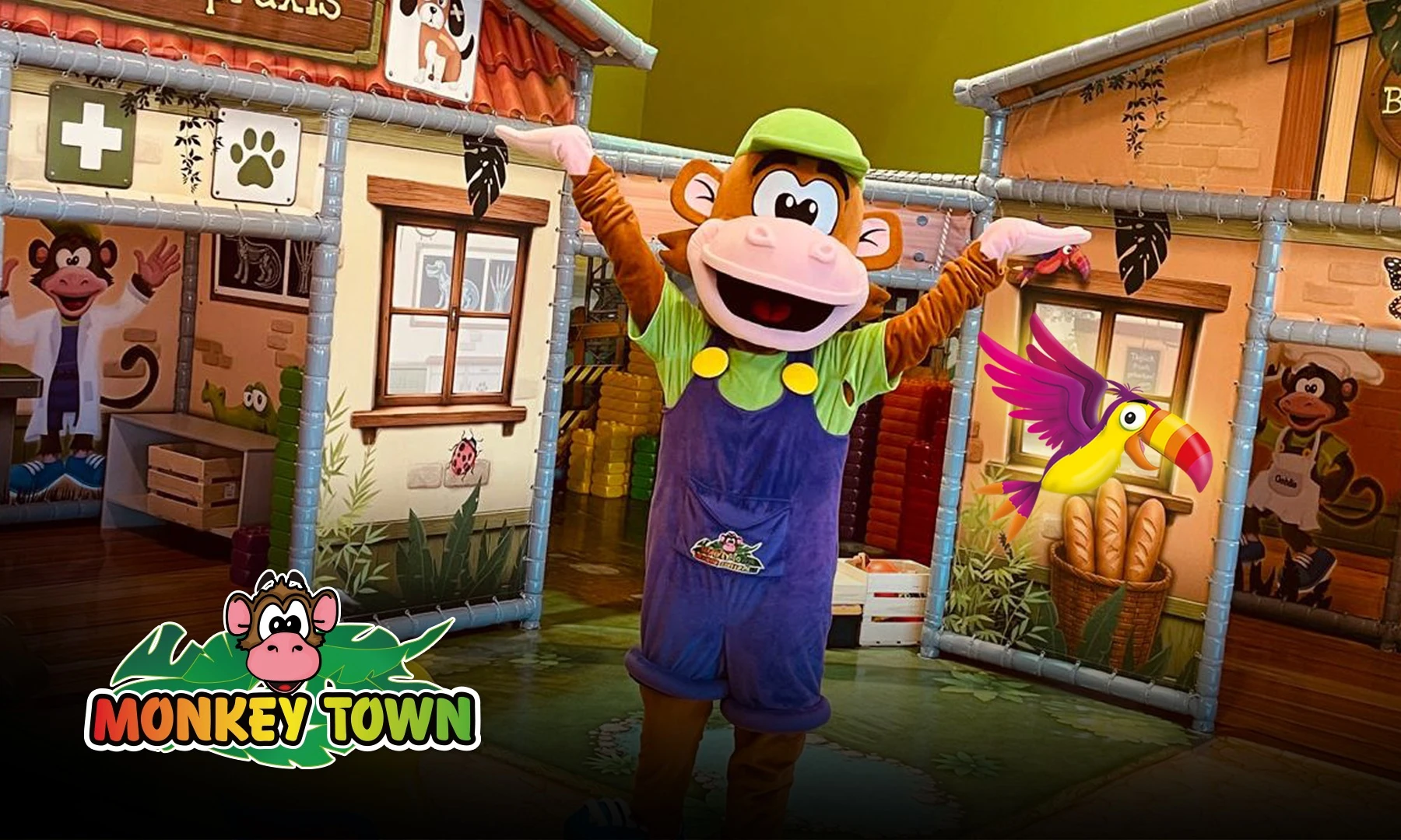 Oehlie as a mascot in the completed Mini Town, with the illustrated vet and bakery