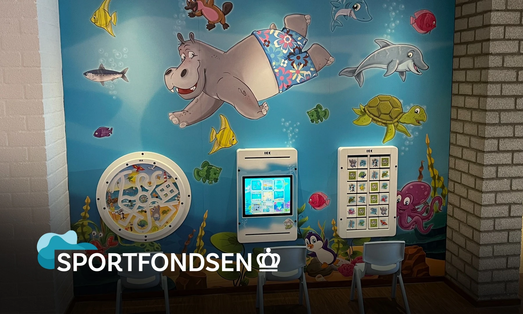 The Jip play wall with physical games and a touchscreen at Sportfondsen
