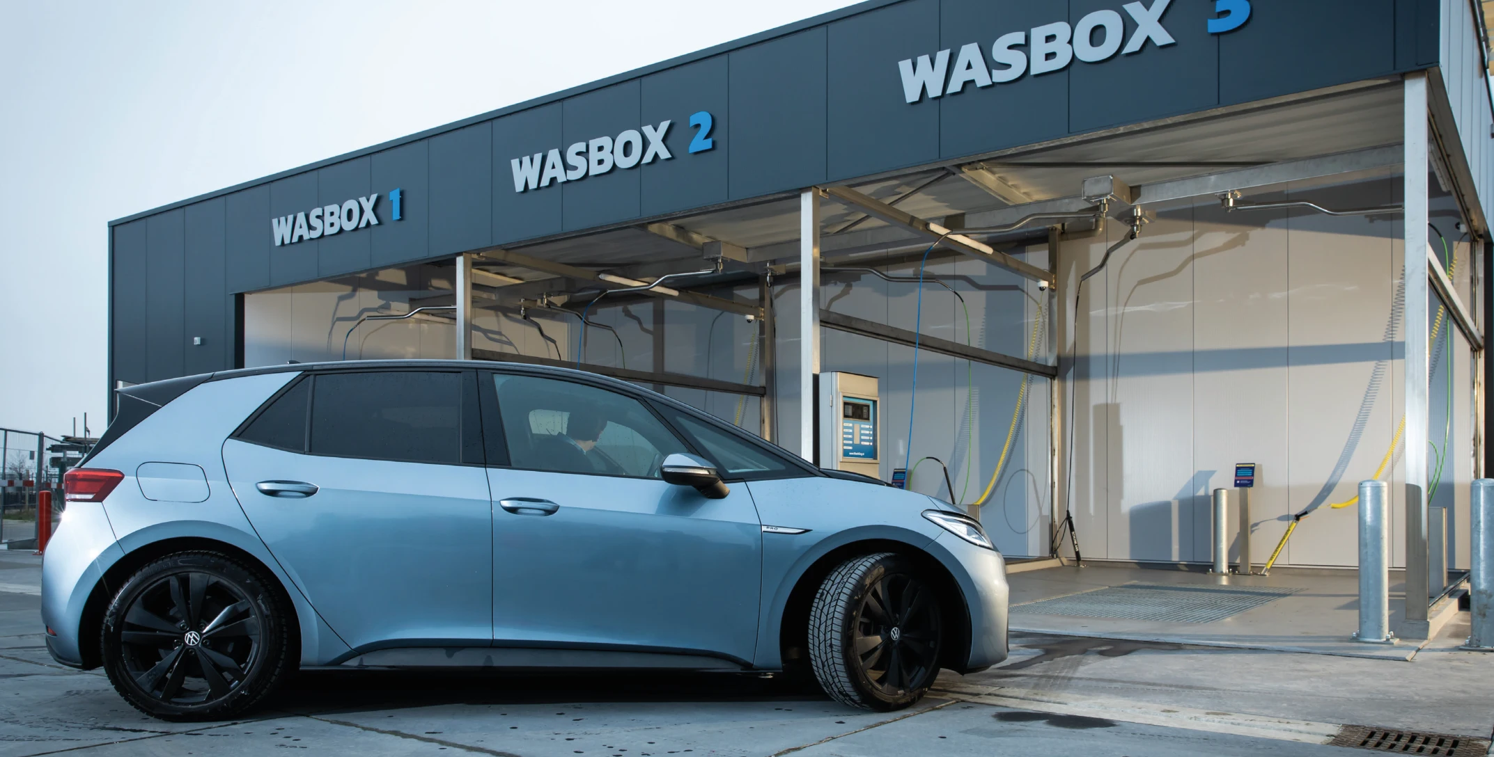 WashKing wash bays with blue accents and clear façade lettering